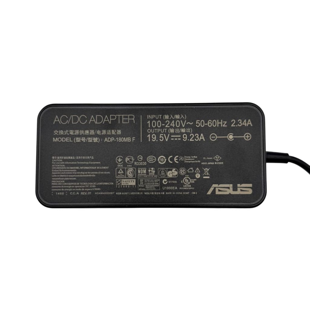Label close-up displaying model and specifications of Asus ADP-180MB F