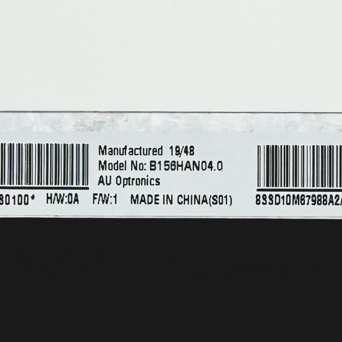 Label close-up B156HAN04.0 AUO panel with part number and FW info - Fixlaptop Georgia